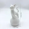 Cat Sculpture on a Ball – Minimalist 3D Art, Simple Black Decoration, Sturdy Spherical Base, Lightweight and Easy-To-Clean Plastic Ornament, Suitable for Home, Office, Bookshelf or Desktop - Perfect Gift for Cat Lovers and Modern Decorators, Fun Design