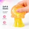 S7a11d3a5662f43b8b324a3713d9d2f2c8.webp Transparent Jellyfish Sequin Squishy Toy – Soft Stretchable Sensory Stress Relief Plush